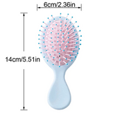 Compact and travel-friendly Mini Detangler Hair Brush by Organic Cecret, designed to glide through knots smoothly without breakage.