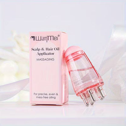 Pink scalp and hair oil applicator with packaging on a white background