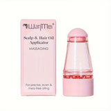 Pink scalp and hair oil applicator with packaging on a white background