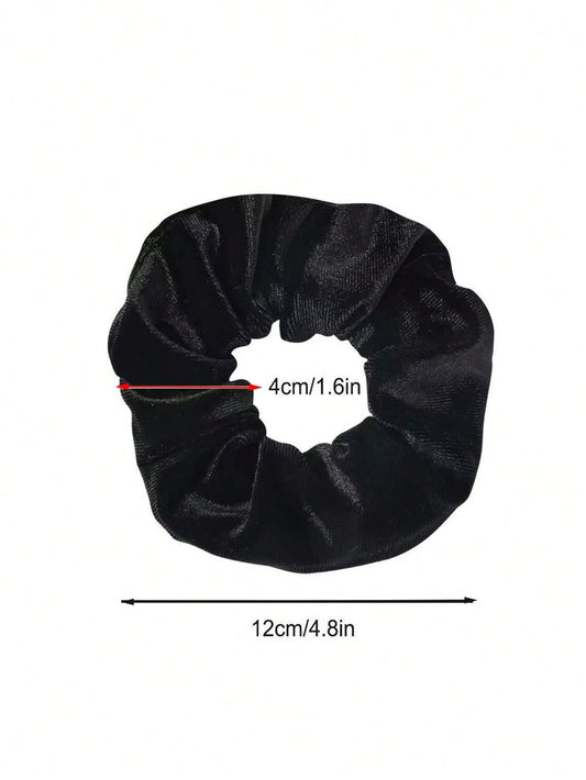 Black scrunchie with measurements on a white background
